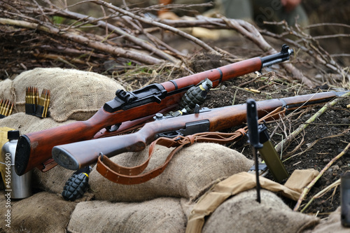 The Lee–Enfield is a bolt-action, magazine-fed repeating rifle that served as the main firearm of the military forces of the British Empire and Commonwealth during the first half of the 20th century,.