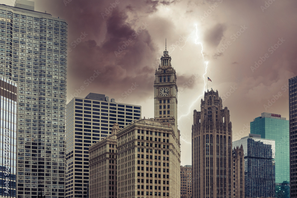 Chicago skyscrapers at rainy day with stormy sky with lightning strike background Chicago skyscrapers at rainy day with stormy sky with lightning strike background