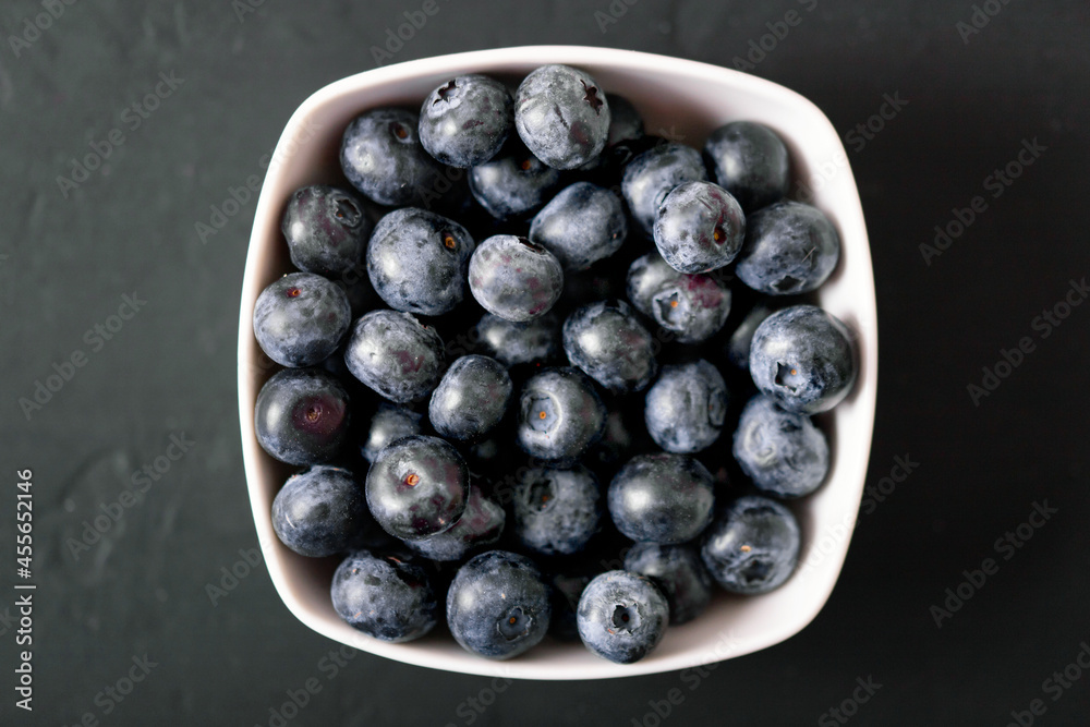 Fresh juicy blackberries on black background. Summer berries. Fresh juicy blackberries on black background. Summer berries.