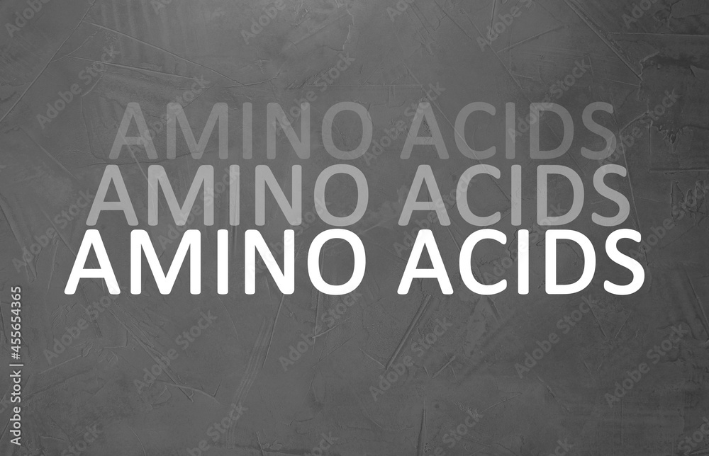 Obraz premium Text Amino Acids on grey stone surface