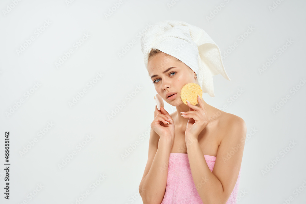 woman with towel cleans skin with sponge health problems hygiene woman with towel cleans skin with sponge health problems hygiene