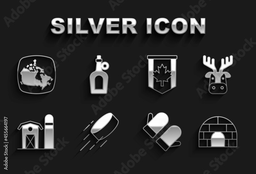Set Hockey puck, Deer head with antlers, Igloo ice house, Christmas mitten, Farm, Pennant flag of Canada, map and Bottle maple syrup icon. Vector