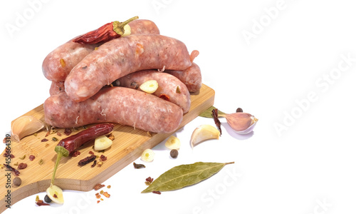 Raw pork sausages.Grilled sausages in close-up, isolated on a white background.Selective focus.