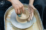 the process of making and processing a clay billet on a potter's wheel