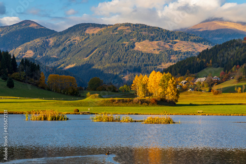Fototapeta Naklejka Na Ścianę i Meble -  autumn pond under the mountains, Murau district,.Styria, Austria