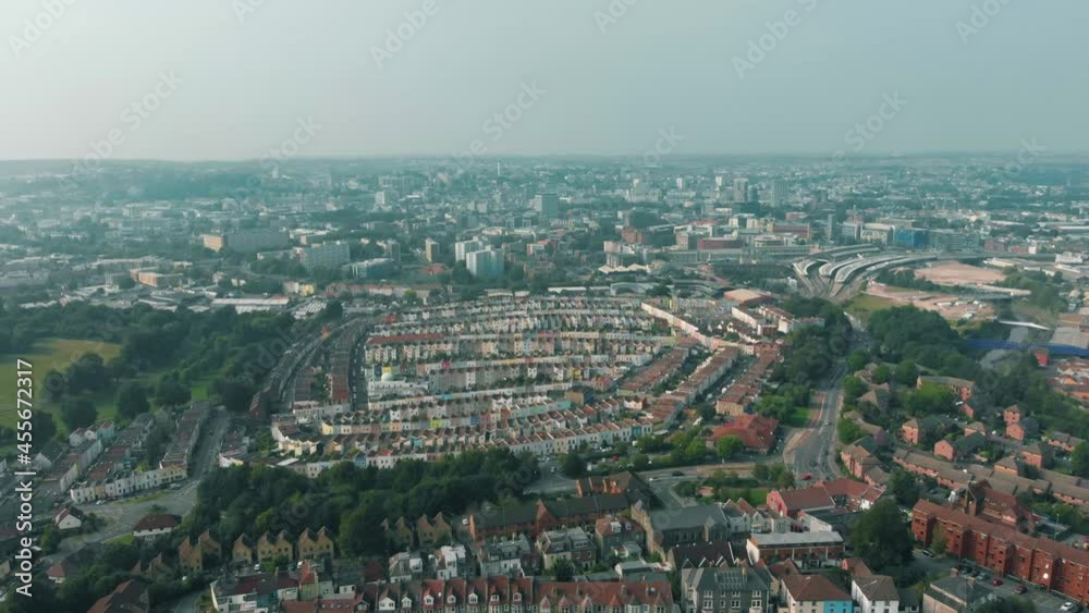 Aerial view of the city center of Bristol, England, showing train station, buildings and multicoloured terraced houses Aerial view of the city center of Bristol, England, showing train station, buildings and multicoloured terraced houses
