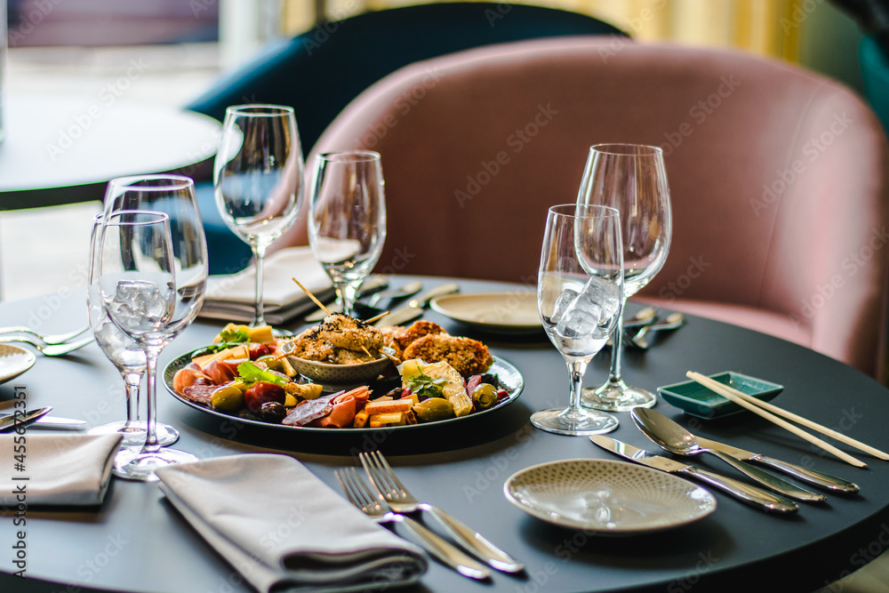 Fototapeta premium Appetizers platter at a restaurant on a table