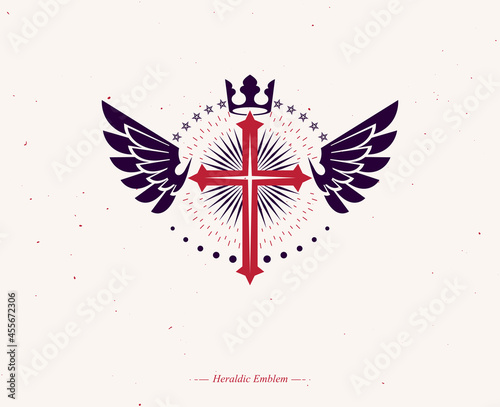Cross of Christianity graphic emblem. Heraldic vector design element. Retro style label, religious insignia decorated with luxury monarch crown and liberty bird wings.