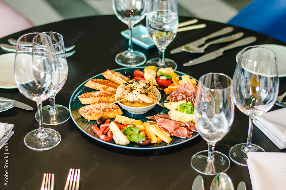 Appetizers platter at a restaurant on a table Appetizers platter at a restaurant on a table