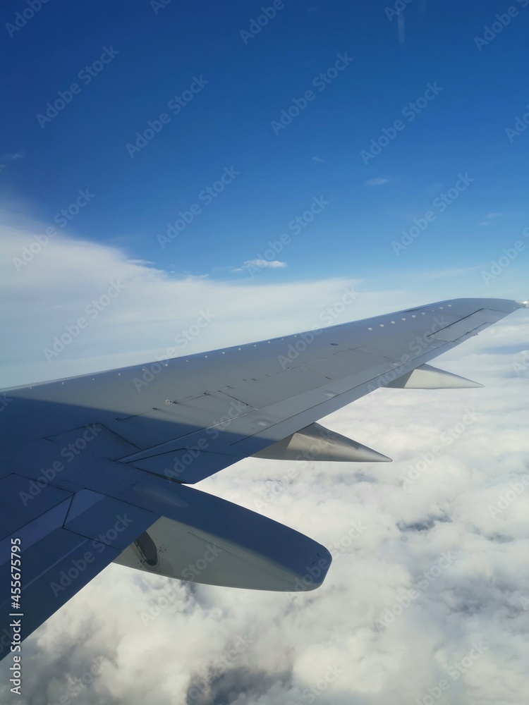 View of the sky , through airplane window.