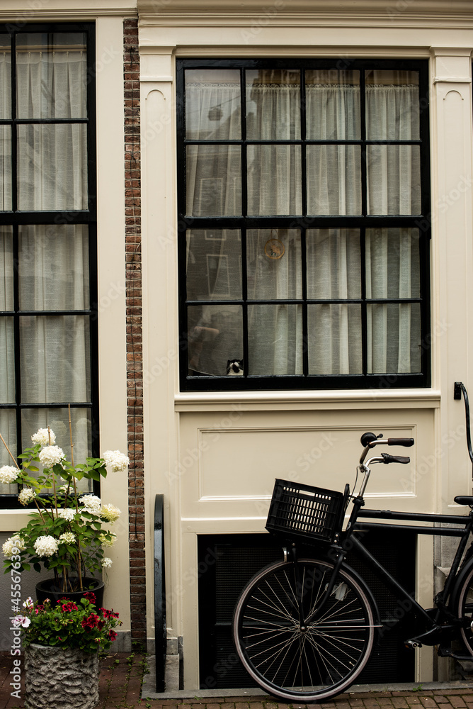 bicycle in front of a house in Amsterdam