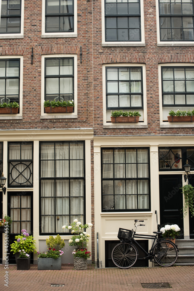 bicycle in front of a house in Amsterdam