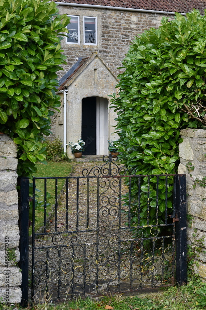 gated entrance and garden path
