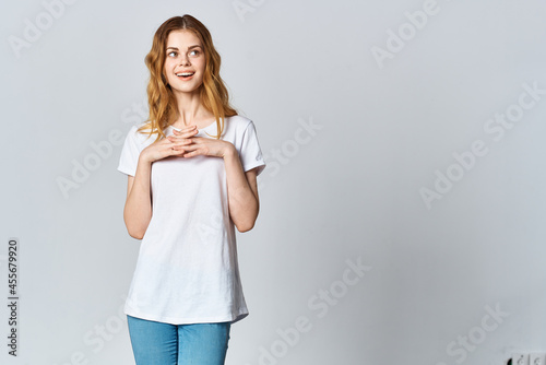 woman in white t-shirt posing fashion design advertisement