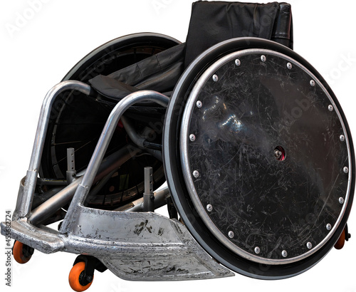 Clipping isolated photography of a professional sports wheelchair used by disabled athletes in wheelchair rugby with a pronounced negative camber for the wheels. photo