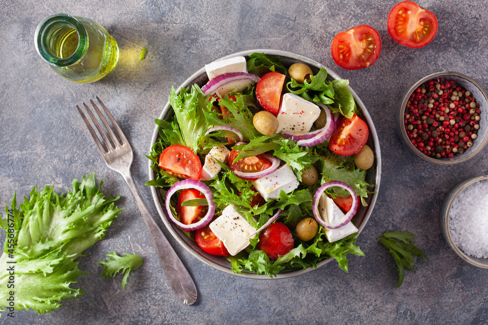 tomato salad with brie cheese olives onion lettuce