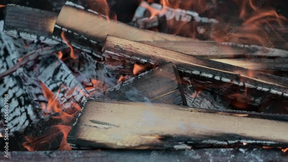 Fireplace with burning coals. Burning wood into charcoal on a barbecue. Fireplace with burning coals. Burning wood into charcoal on a barbecue.