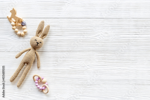 Plush toy rabbit for newborn baby - background for baby shower