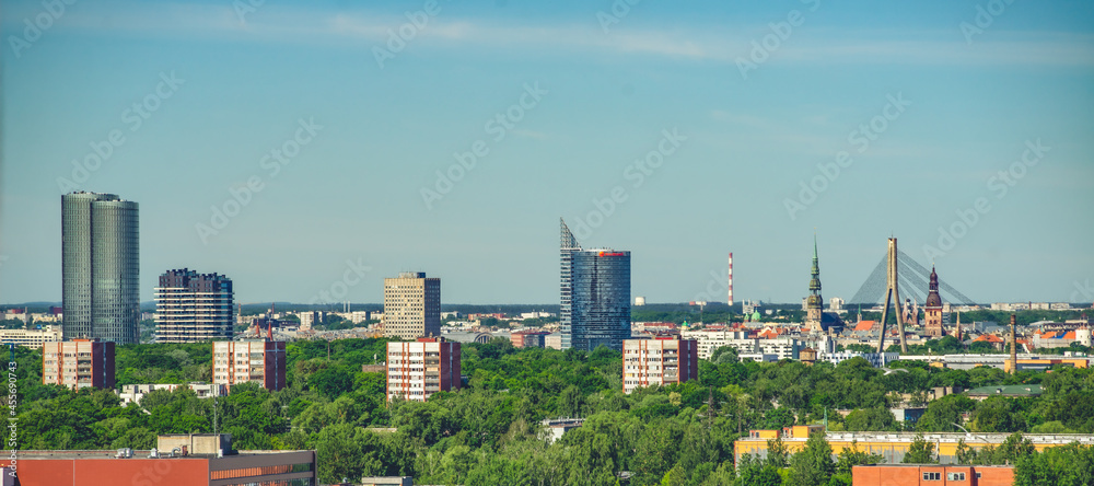 Obraz premium Summer cityscape of Riga. Top view. Modern urban architecture.