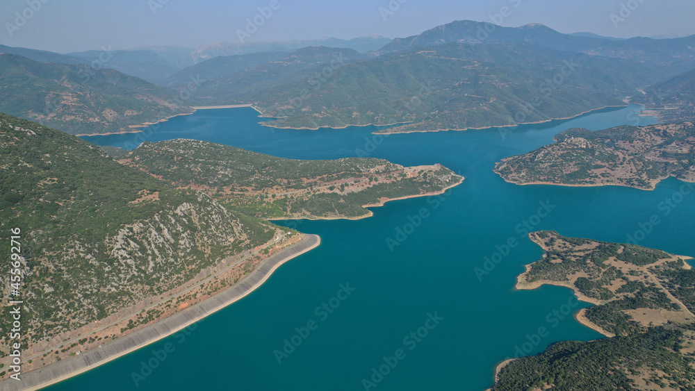 Naklejka premium Aerial drone photo of huge fjord looking lake of Mornos a clear water supply for Attica region, Fokida prefecture, Greece