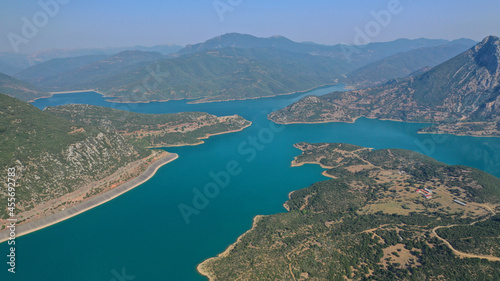 Aerial drone photo of huge fjord looking lake of Mornos a clear water supply for Attica region, Fokida prefecture, Greece