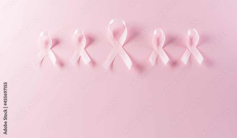 Pink ribbons on pastel background, Symbol of women's breast cancer awareness, Health care and medical concept.