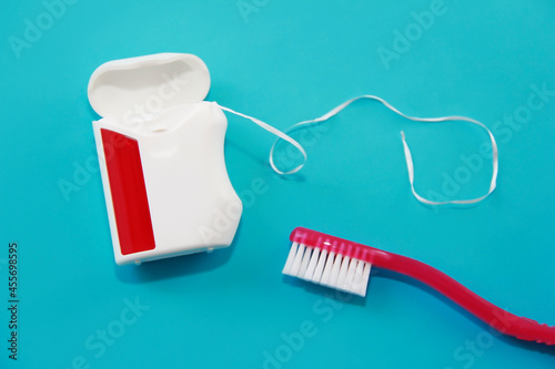 dental floss and a toothbrush for brushing your teeth