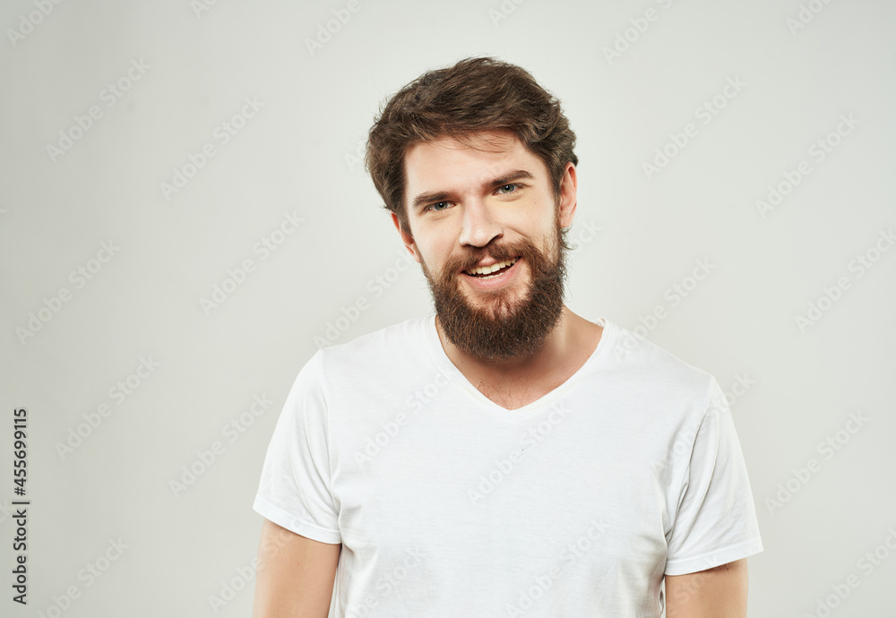 © SHOTPRIME STUDIO - bearded man in white t-shirt emotions anger expression