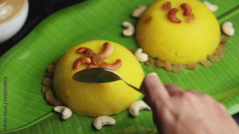 woman eating Rava kesari Kesari bath sheera suji halwa Indian sweet