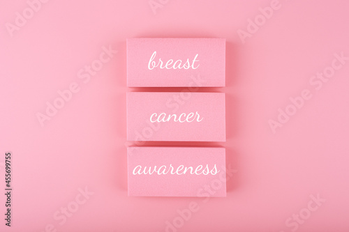 Bright pink minimal Breast cancer awareness concept. Creative composition for cancer awareness campaign in October, postcard, invitation or banner
