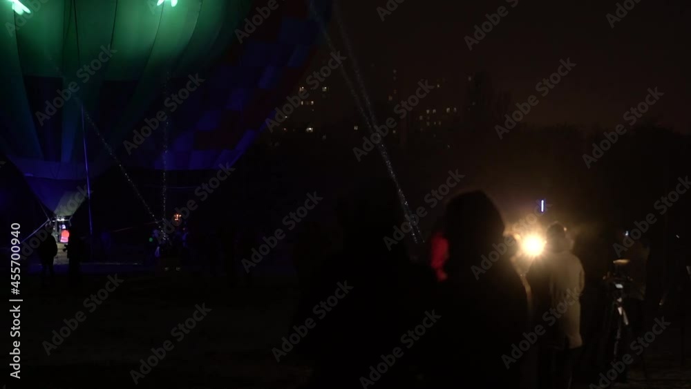 Hot air balloon festival, Night light show Ukraine, slow motion. Kiev December 18, 2020 