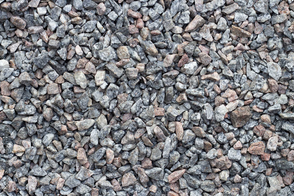 Decorative gray and white pebble stones as background. High quality photo Decorative gray and white pebble stones as background. High quality photo