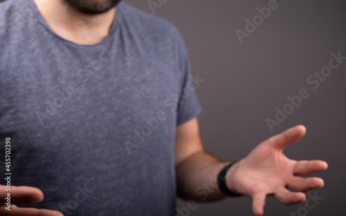 man mid section with hand out