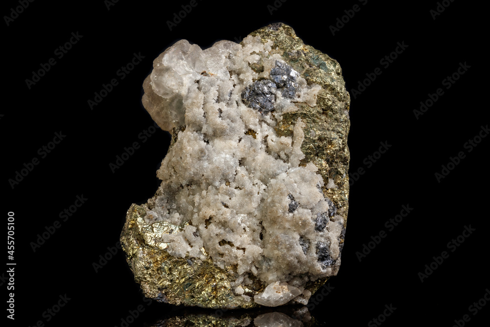 Macro of a mineral stone Sphalerite with fluorite and pyrite on a black background close up Macro of a mineral stone Sphalerite with fluorite and pyrite on a black background close up