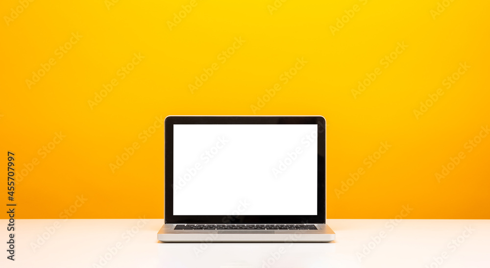 Education background concept. Laptop with blank screen on Yellow background. Banner design copy space. Education background concept. Laptop with blank screen on Yellow background. Banner design copy space.