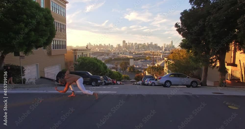Aerial: Ballet Dancer dancing on the street in san francisco, USA