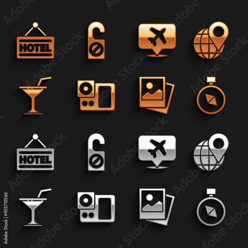 Set Photo camera, Location on the globe, Compass, Martini glass, Speech bubble with airplane, Signboard text Hotel and Please do not disturb icon. Vector