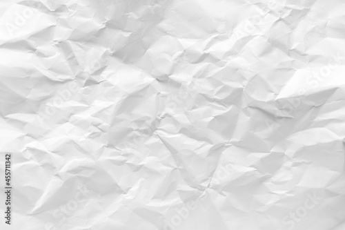 White crumpled paper texture background.