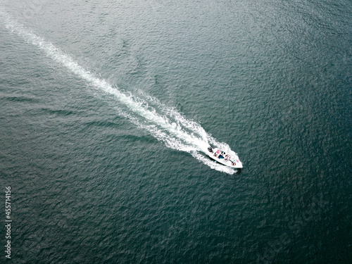 Boat moving through ocean, drone Hong Kong