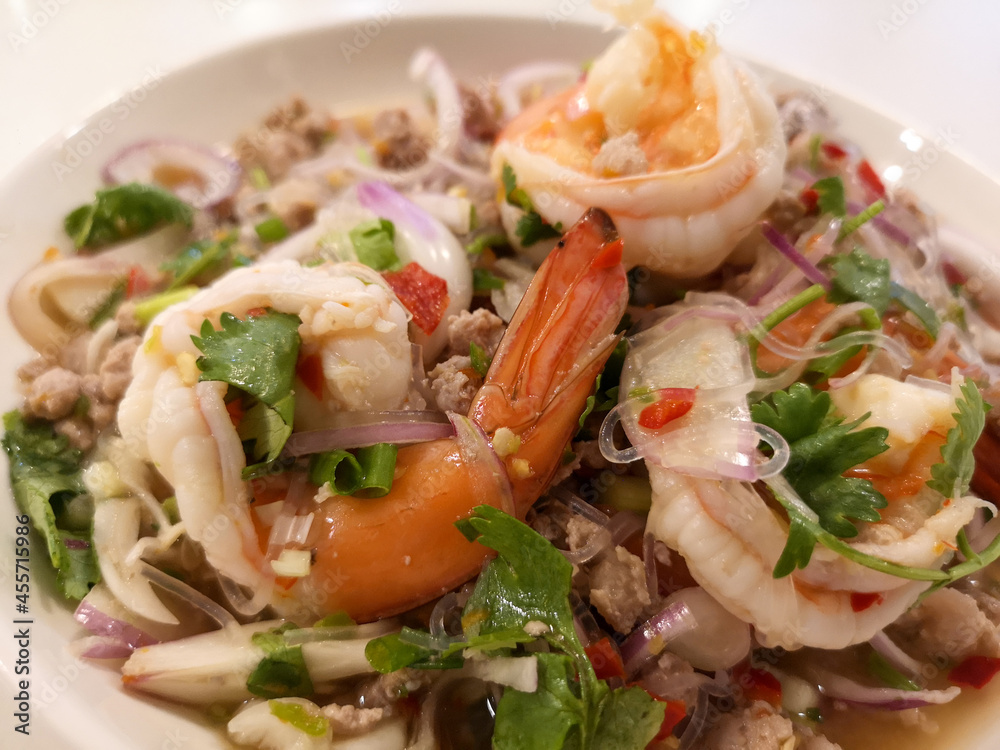 Spicy glass noodle salad with shrimps and minced pork Thai style Spicy glass noodle salad with shrimps and minced pork Thai style