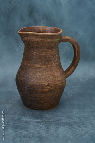   Ceramics, a ceramic product made with your own hands, made on a potter's wheel, a jug, a mug, clay.       