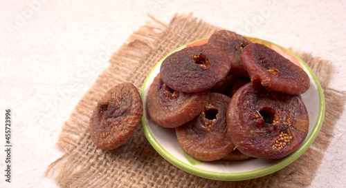 Fresh Figs or Anjeer fruit healthy vegan food concept organic dry fruits on wooden background. photo