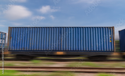 Train with container cargo boxes at railway station transport logistic distribution goods is industry business concept.
