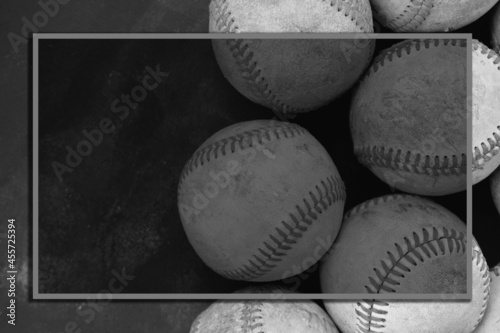Photography Vintage style baseball background with old used balls from game and border with copy space