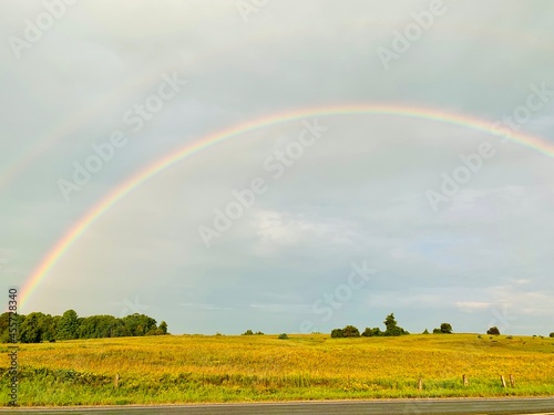 rainbow over field © Heather