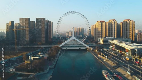 Cityscape of Tianjin Ferris wheel, eyes. The most popular modern tourist attraction in Tianjin, China. (aerial photography) photo