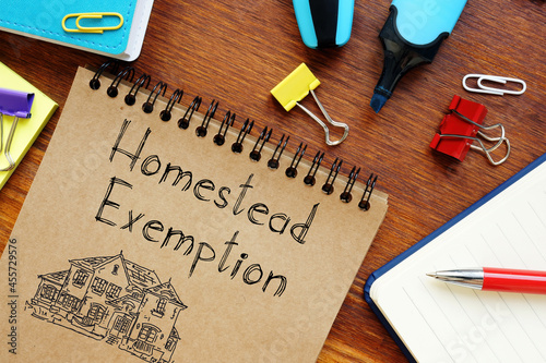 Homestead Exemption is shown on the business photo using the text photo