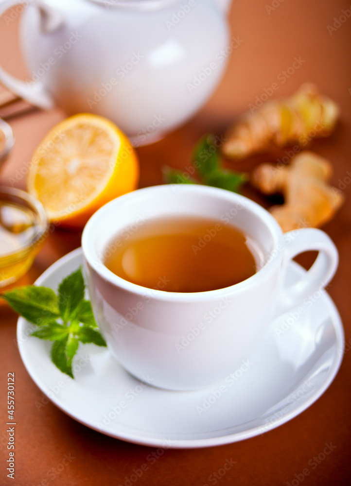 Refreshing ginger tea with lemon, mint leaf and honey Refreshing ginger tea with lemon, mint leaf and honey