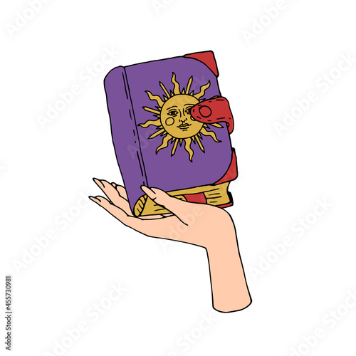 Vintage Gold and Black Mystic Spell Book with sun on cover in female hand Illustration
