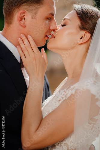kiss. lovers and happy bride and groom. romance and tenderness in relationships.